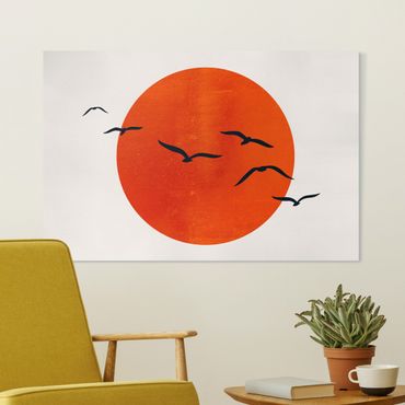 Stampa su tela - Stormo di uccelli davanti al sole rosso - Orizzontale 3:2