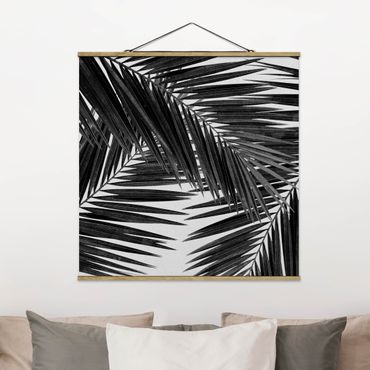 Foto su tessuto da parete con bastone - Scorcio tra foglie di palme in bianco e nero - Quadrato 1:1