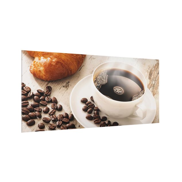 Paraschizzi cucina Tazza di caffè a vapore con chicchi di caffè