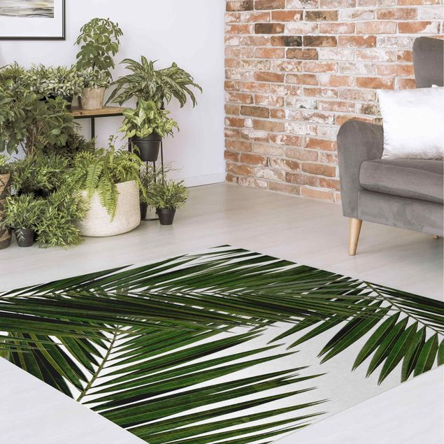 tappeto per esterno Vista attraverso le foglie di palma verde