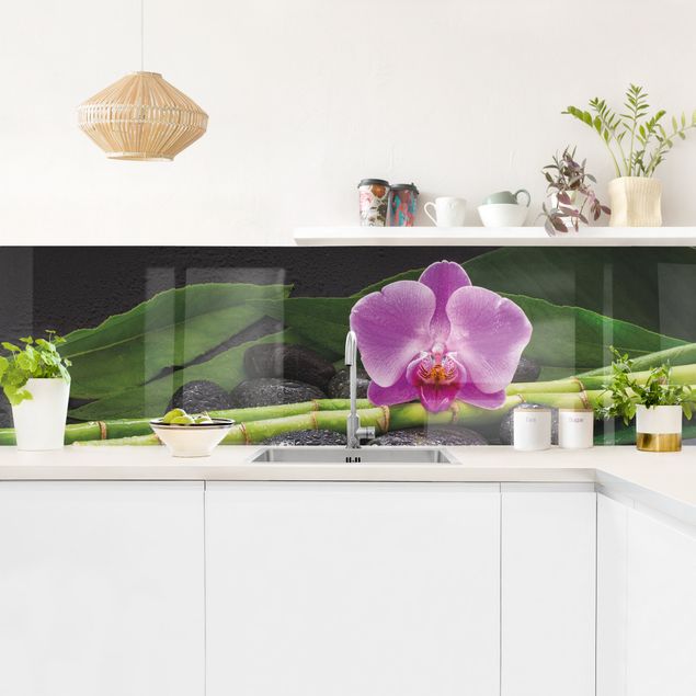 rivestimenti cucina effetto marmo Bambù verde con fiore di orchidea