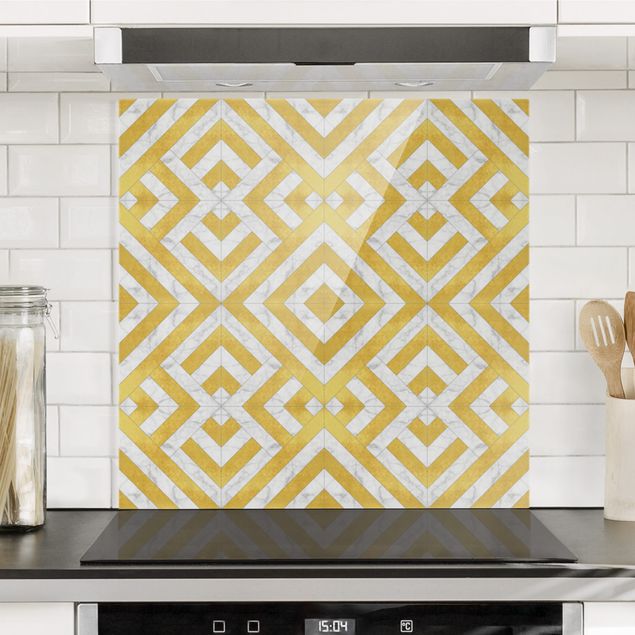 Piastrelle paraschizzi cucina moderna  Mix di piastrelle geometriche Art Déco in marmo dorato