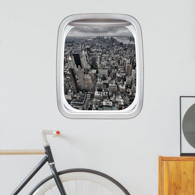 Adesivi murali 3d Finestrino dell'aereo vista su Manhattan