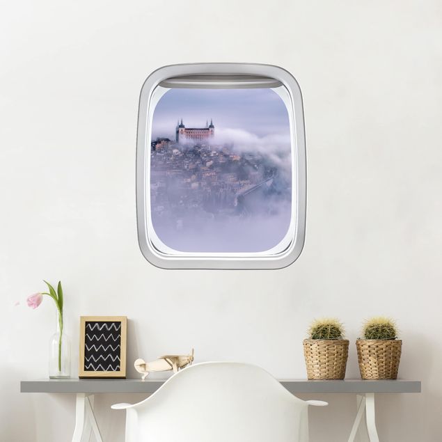 Adesivi murali 3d Finestrino dell'aereo Città di Toledo nella nebbia