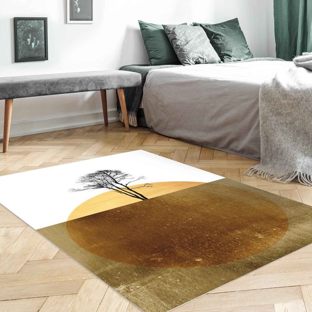 tappeto color oro Sole d'oro con albero