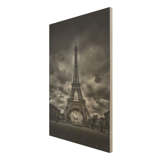 Quadri su legno Torre Eiffel davanti alle nuvole in bianco e nero