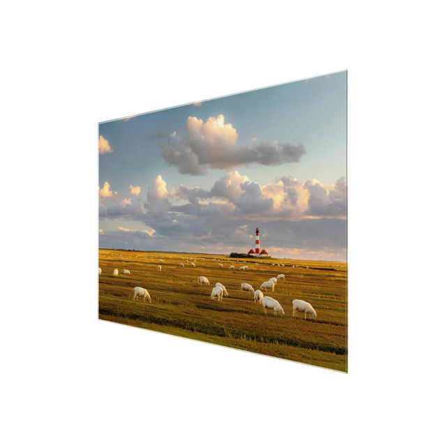 Quadro verde Faro sul Mare del Nord con gregge di pecore