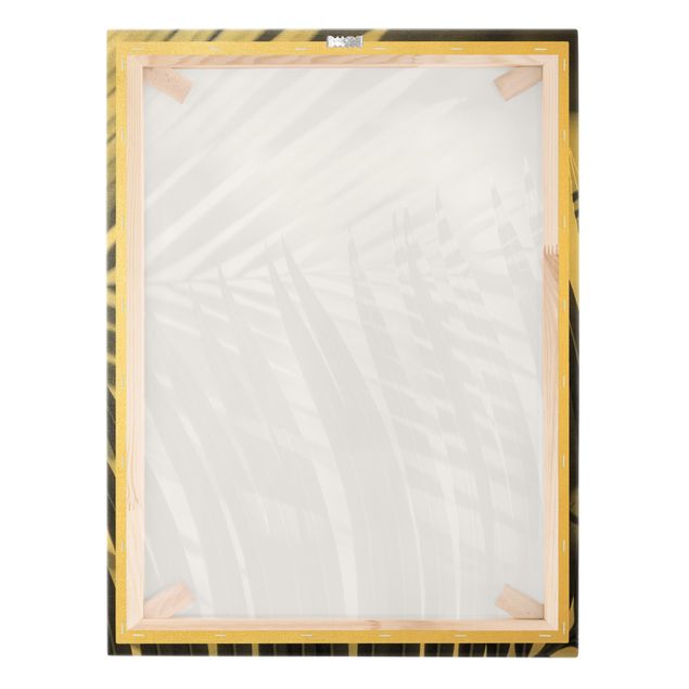 Quadro su tela oro - Giochi di ombre su ramo di palma