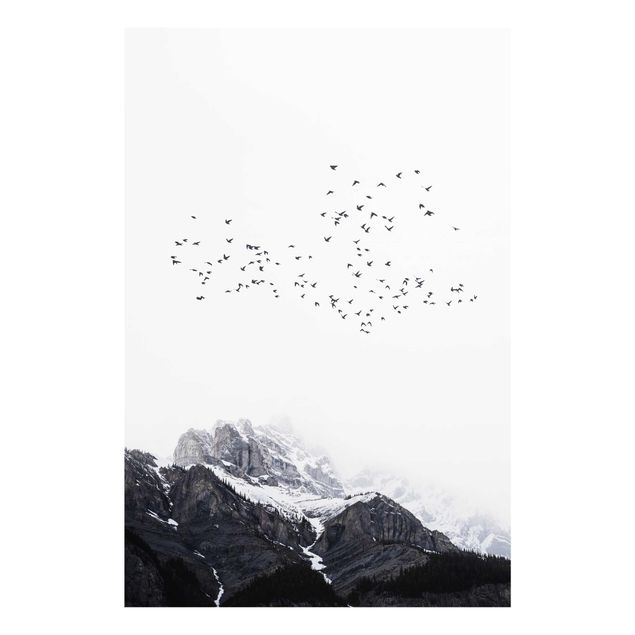 Quadri in vetro con paesaggio Stormo di uccelli di fronte alle montagne in bianco e nero