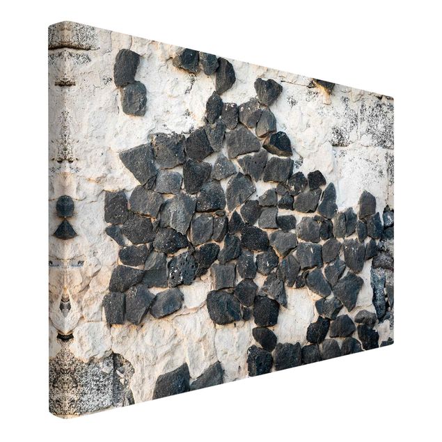 Quadri grigi Muro con pietre nere