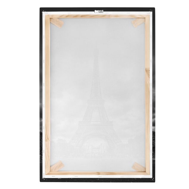 Stampa su tela Torre Eiffel davanti alle nuvole in bianco e nero