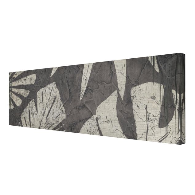 Stampe su tela Sfondo grigio scuro con foglie di palma