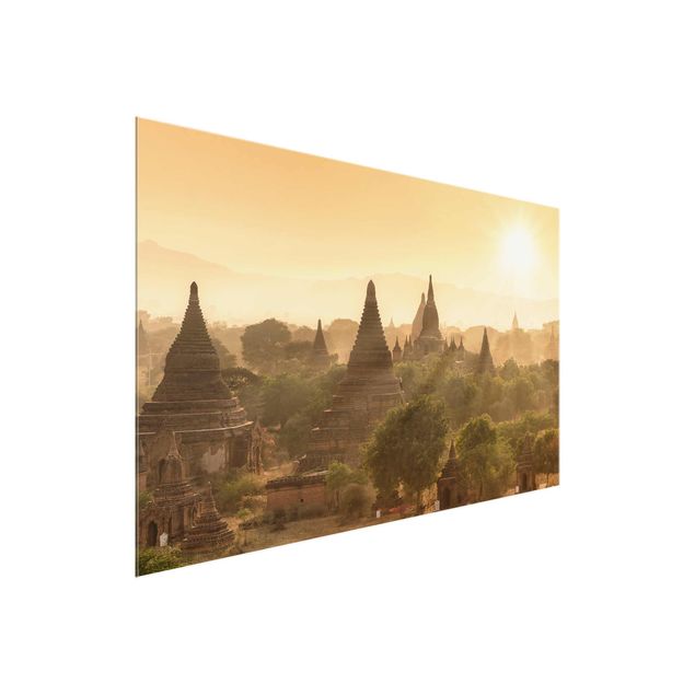 Quadri in vetro con architettura e skylines Il sole che tramonta su Bagan