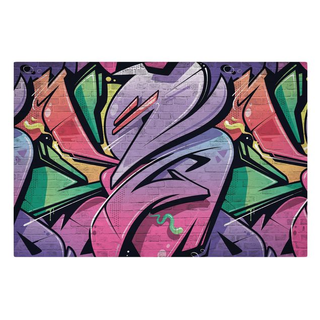 Stampe Muro di mattoni con graffiti colorati