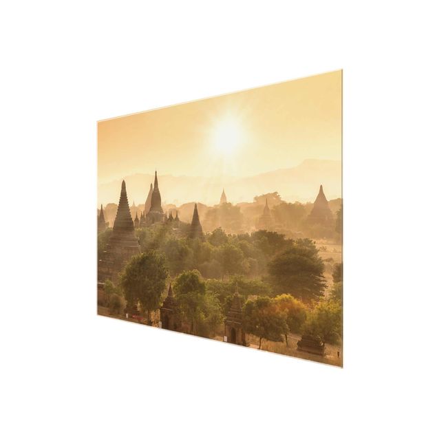 Quadri in vetro con paesaggio Il sole che tramonta su Bagan