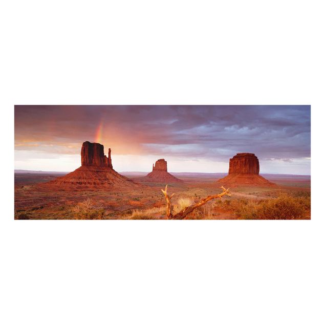 Quadri in vetro con paesaggio Monument Valley al tramonto