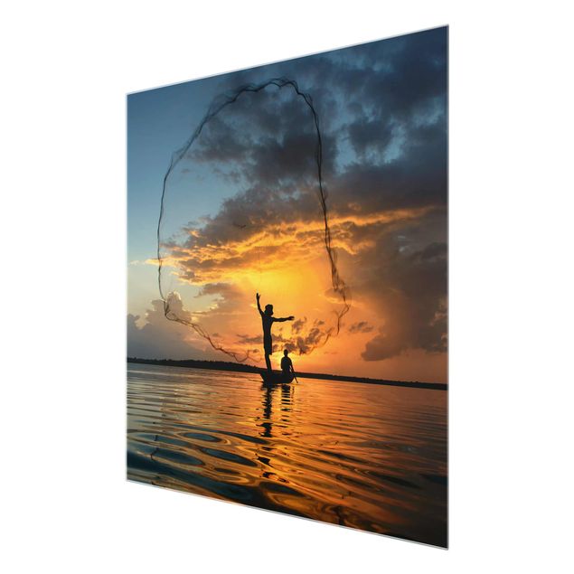 Quadri in vetro con paesaggio Rete da pesca al tramonto