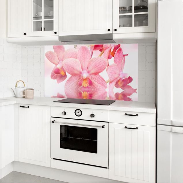 Decorazione cucina Orchidea rosa chiaro sull'acqua