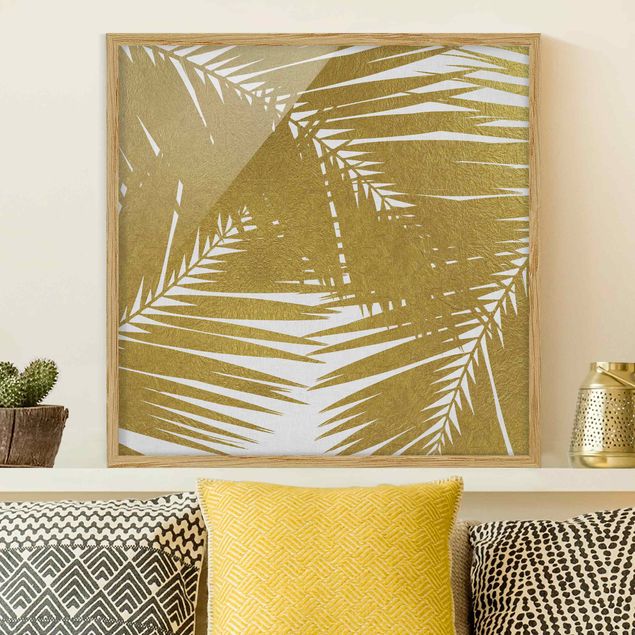 Quadri con paesaggio Vista attraverso le foglie di palma dorate