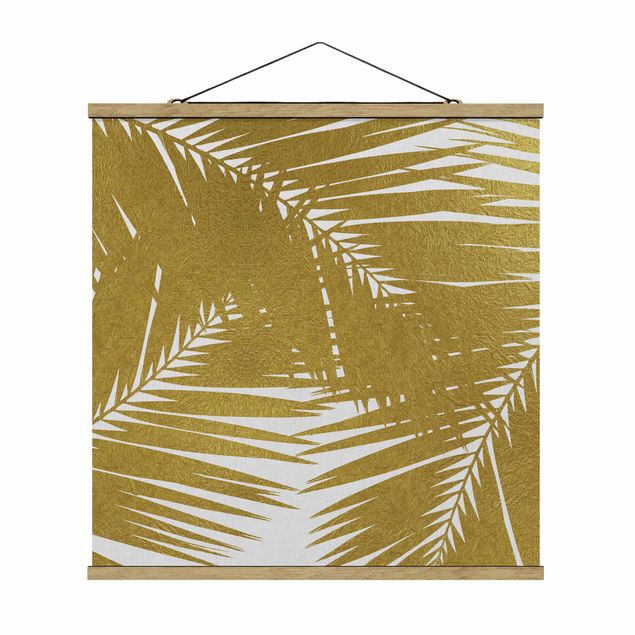 Riproduzioni quadri Vista attraverso le foglie di palma dorate