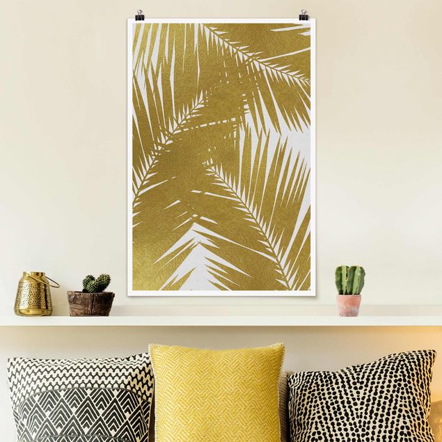 Quadri con paesaggio Vista attraverso le foglie di palma dorate