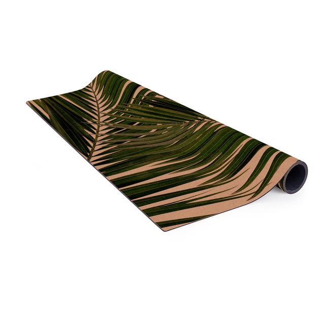 tappeti sala da pranzo Vista attraverso le foglie di palma verde