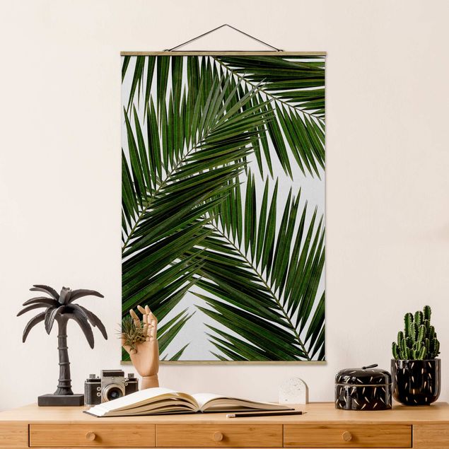Quadro paesaggio Vista attraverso le foglie di palma verde