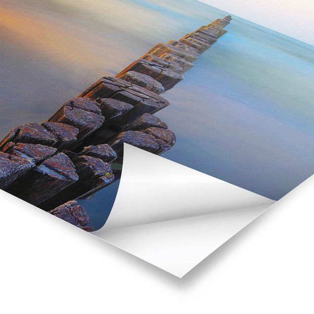 Poster paesaggi naturali Groynes al tramonto sull'oceano