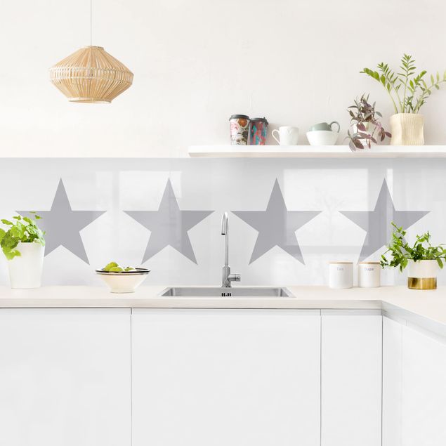 Rivestimento cucina con disegni Grandi stelle grigie su bianco