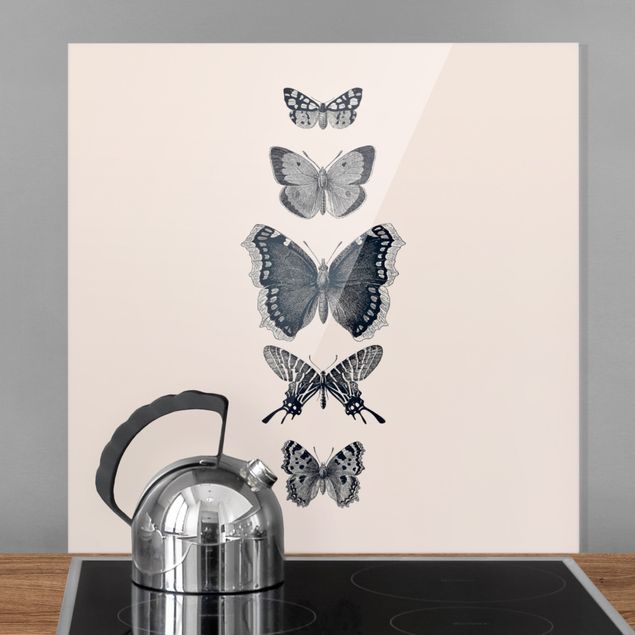 Paraschizzi con animali Farfalle d'inchiostro su sfondo beige