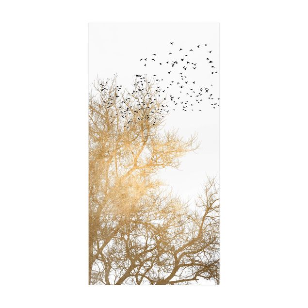 tappeto color oro Stormo di uccelli davanti all'albero d'oro