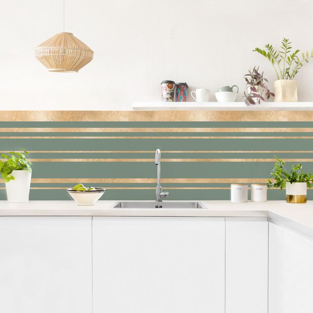 Rivestimento cucina moderna Strisce dorate su sfondo verde