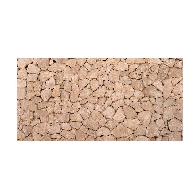 tappeti marroni Largo muro di pietra pugliese antico