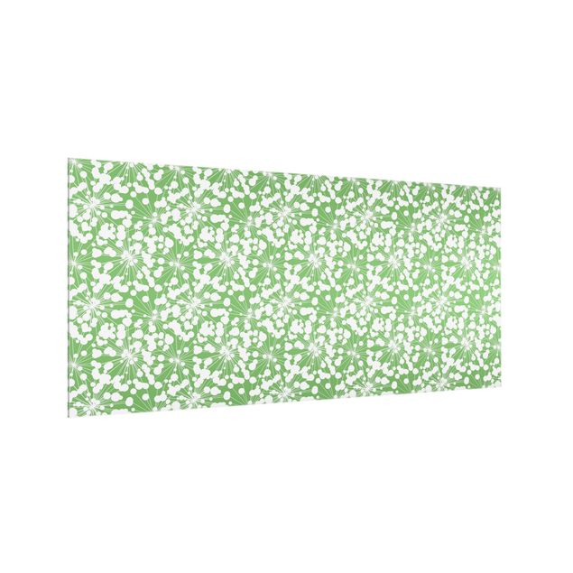 Paraschizzi astratto Motivo naturale Soffione con puntini davanti al verde