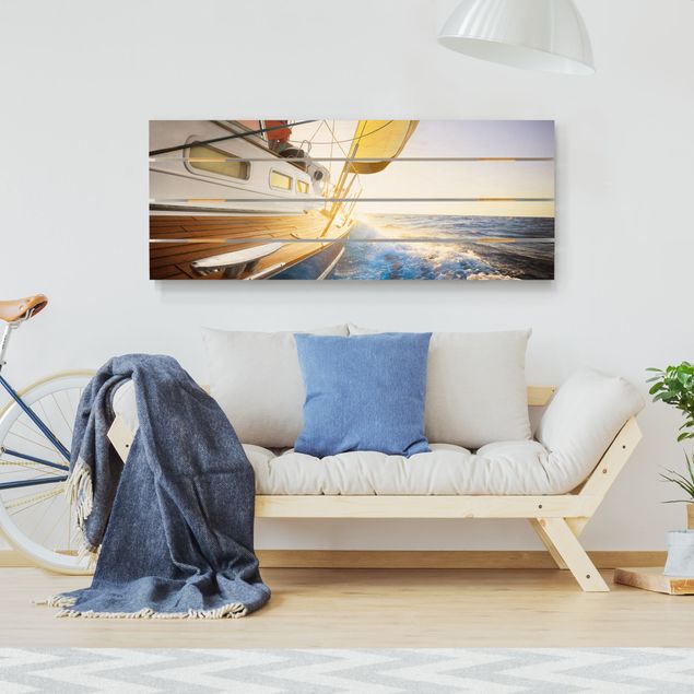 Quadri in legno con paesaggio Barca a vela sull'oceano blu in pieno sole