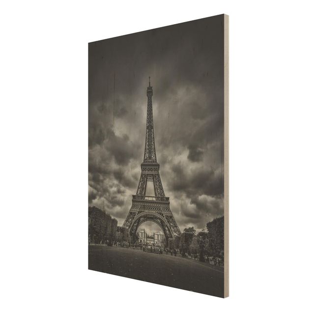 Quadri su legno Torre Eiffel davanti alle nuvole in bianco e nero
