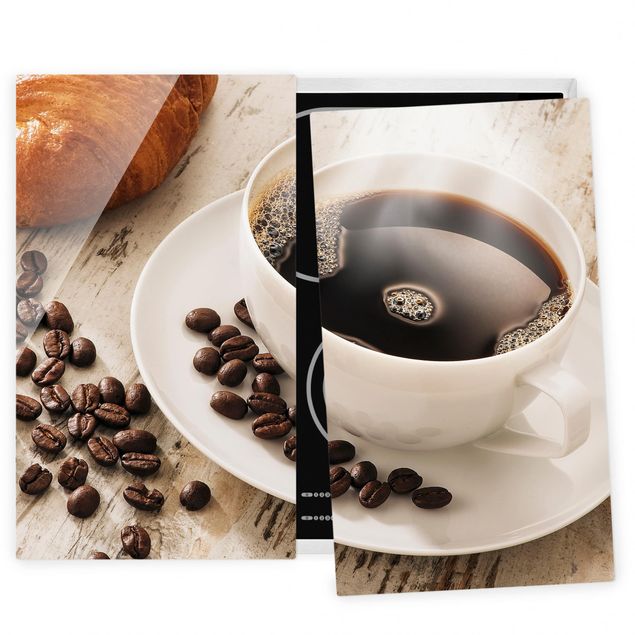 Coprifornelli con dolci caffe Tazza di caffè a vapore con chicchi di caffè