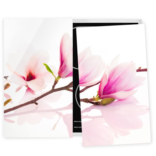 Coprifornelli con fiori Delicato ramo di magnolia