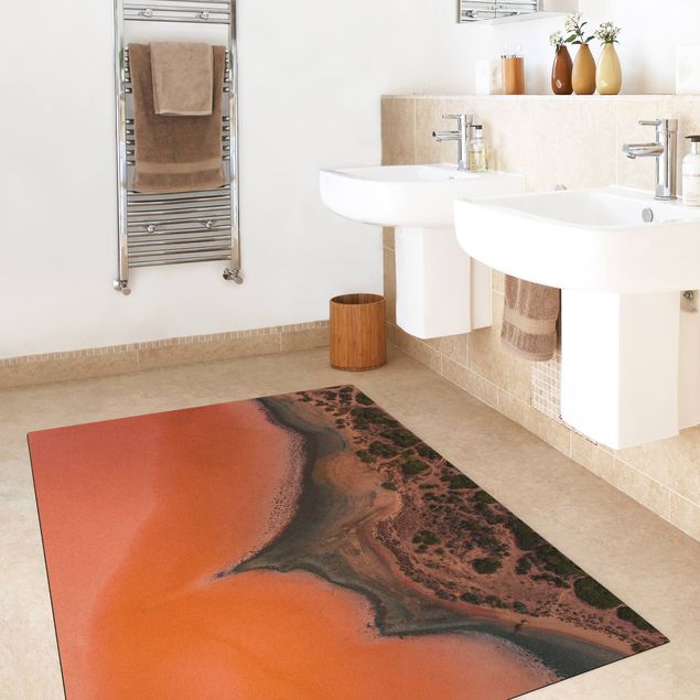 tappeto sala da pranzo Riva del lago arancione in Sardegna