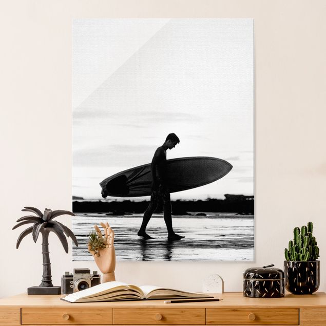 Quadri in vetro con spiaggia Ragazzo surfista in ombra di profilo