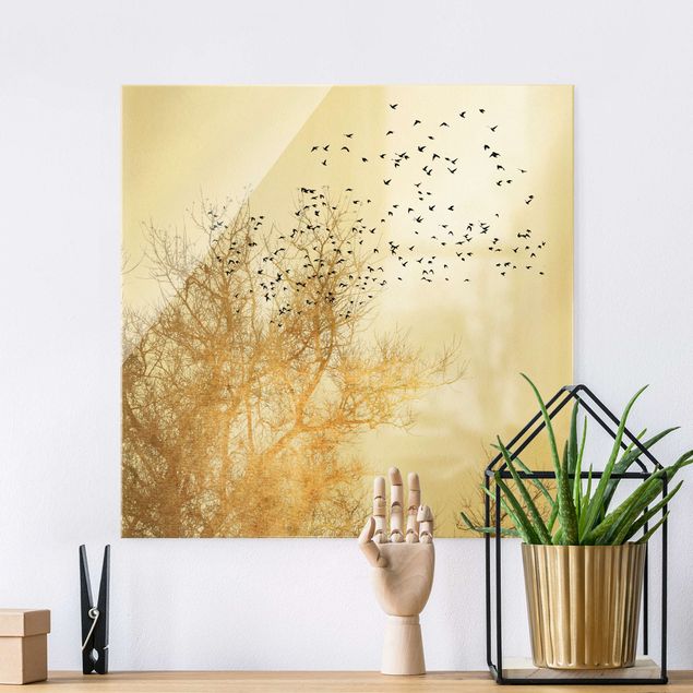 Quadro paesaggio Stormo di uccelli davanti all'albero d'oro
